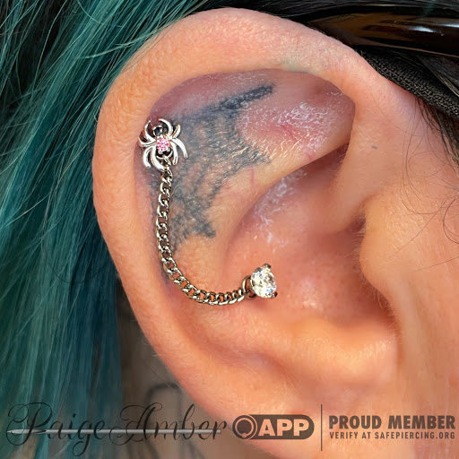 Explore half sleeve ocean tattoo ideas, creative tattoo ideas in Oshkosh, available at Piercings by Paige at Big Guns Tattoo