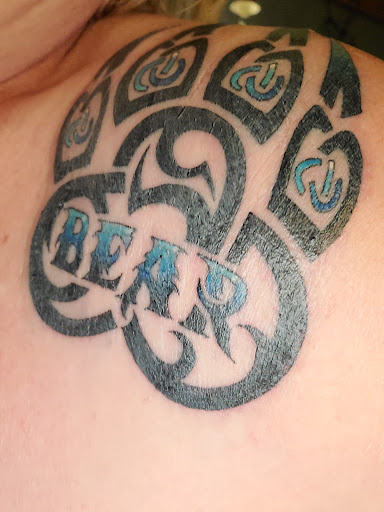 Explore side face tattoo ideas, creative tattoo ideas in Kearney, available at Olde Towne Tattoo, LLC