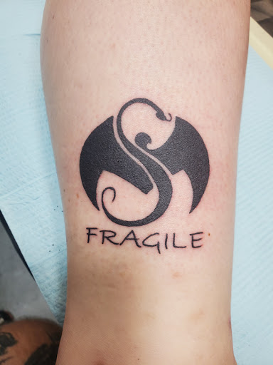 Explore solar system tattoo ideas, creative tattoo ideas in Fort Smith, available at Tactical Tattoo LLC