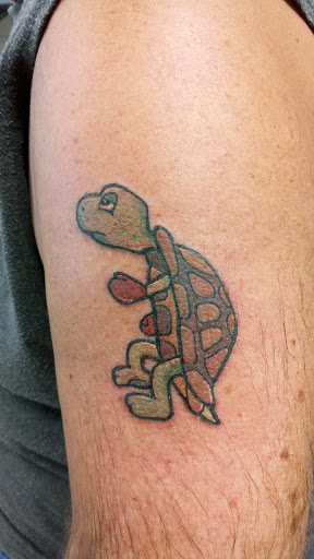 Explore wedding ring tattoo ideas for men, creative tattoo ideas in Abilene, available at Sacred Art