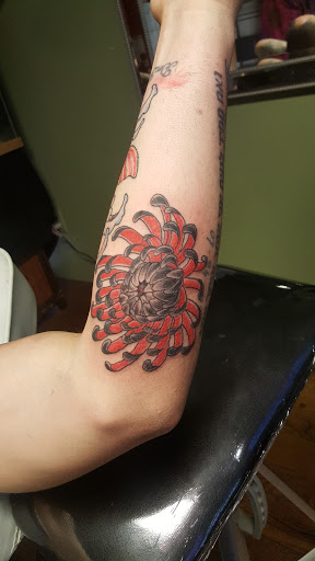 Explore sunflower and butterfly tattoo ideas, creative tattoo ideas in Hillsboro, available at MOO MANU TATTOO