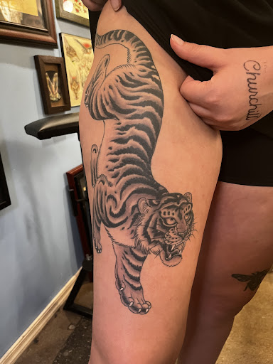 Explore purple flower tattoo ideas, creative tattoo ideas in Phoenix, available at Lucky Sparrow Tattoo