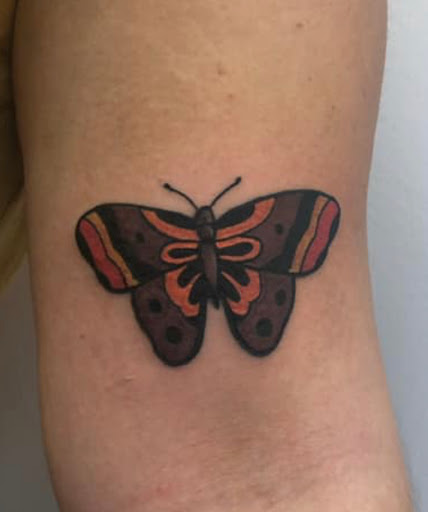 Explore cross tattoo ideas for men, creative tattoo ideas in Toledo, available at 4 Nineteen Ink