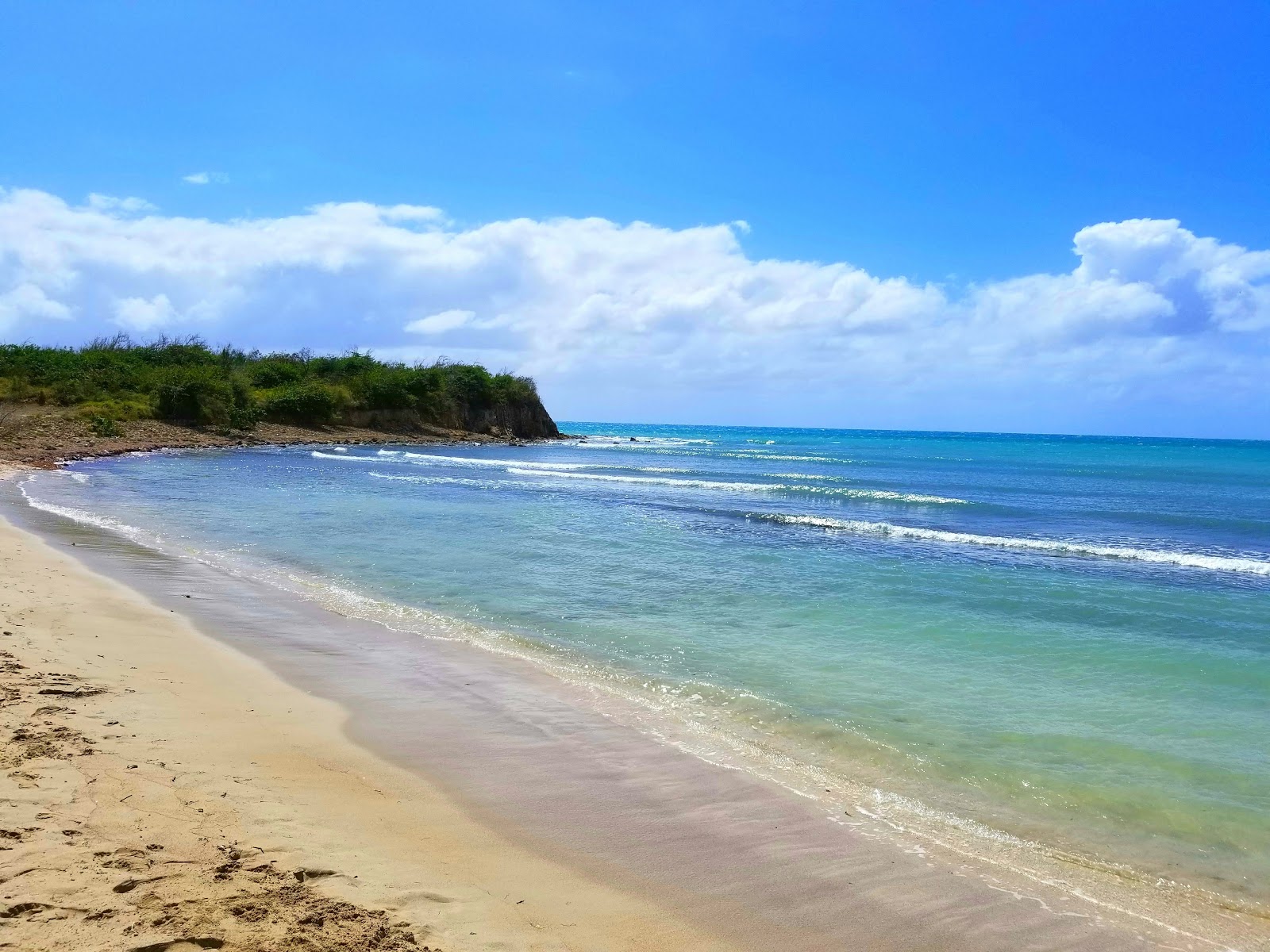 Foto di Hay Penny beach con una superficie del sabbia luminosa