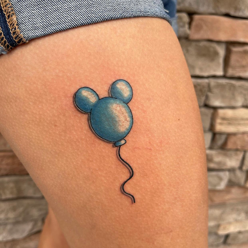 Explore lisa frank tattoo ideas, creative tattoo ideas in Davenport, available at Fine Ink Studios Tattoos