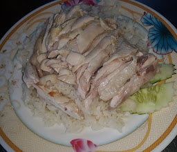 รุจน์ราชาข้าวมันไก่ตลาดสีมุมเมือง photo