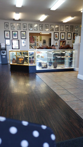 Explore compass tattoo ideas for men, creative tattoo ideas in Roseville, available at Dv8 Tattoo and Body Piercing