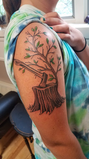 Explore book lovers tattoo ideas, creative tattoo ideas in Winona, available at Black Moth Tattoo