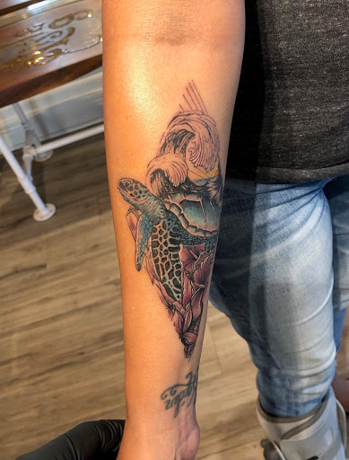 Explore cleavage tattoo ideas, creative tattoo ideas in Dayton, available at Aisle 9 Tattoo