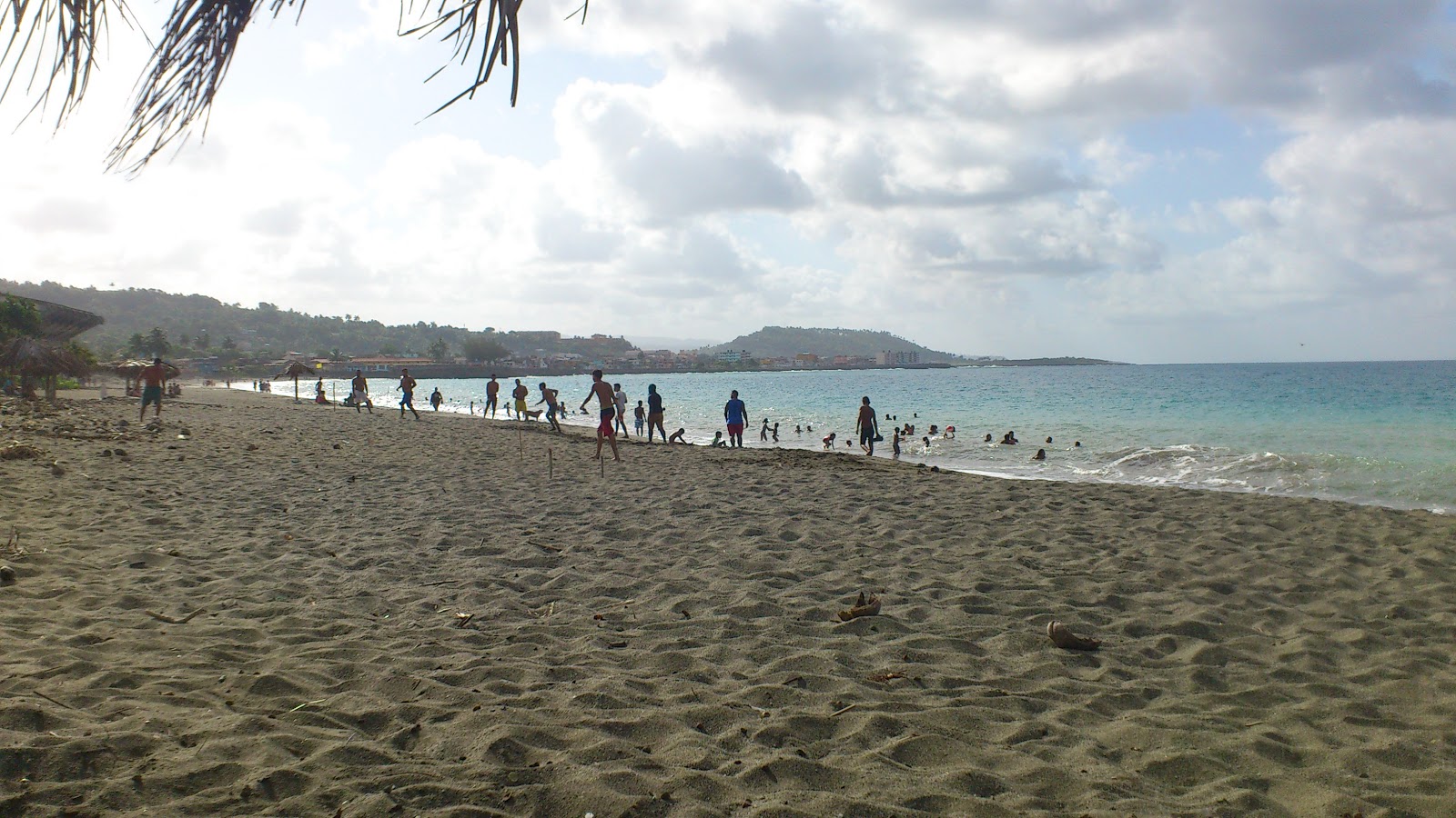 Foto van Playa de Miel met recht en lang