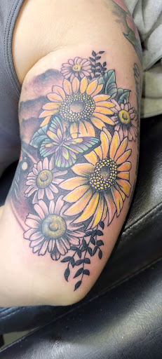 Explore tattoo ideas with meanings, creative tattoo ideas in Angola, available at Hoodlum Ink