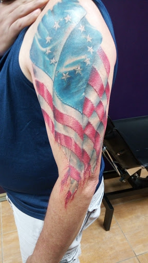 Explore neck name tattoo ideas, creative tattoo ideas in Baldwin, available at Salvation Tattoo