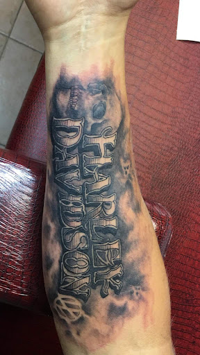 Explore weightlifting tattoo ideas, creative tattoo ideas in Fairborn, available at Impressionable Ink Tattoo