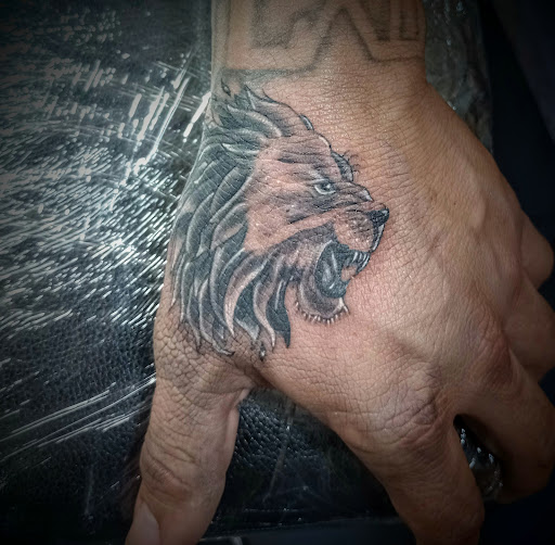 Explore tattoo ideas for guys on chest, creative tattoo ideas in Clintonville, available at Temple Ink Tattoo Shop