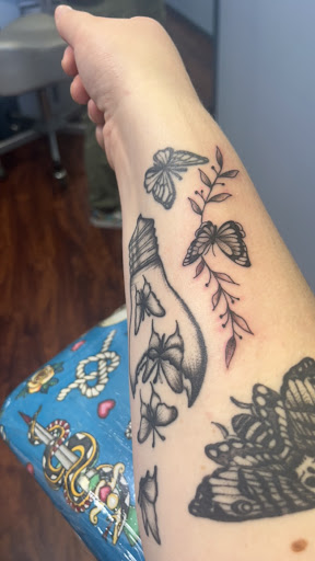 Explore long tattoo ideas, creative tattoo ideas in Hudson, available at Twisted Canvas Tattoo and Art Studio