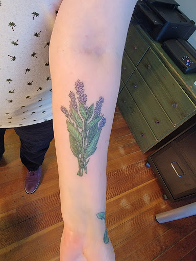 Explore neck tattoo ideas for females, creative tattoo ideas in Salem, available at Inclusion Ink