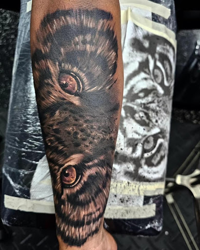 Explore simple male tattoo ideas, creative tattoo ideas in Fort Myers, available at Loyal 2 The Coil Tattoos & Piercings (Edison Mall Location Entrance F)