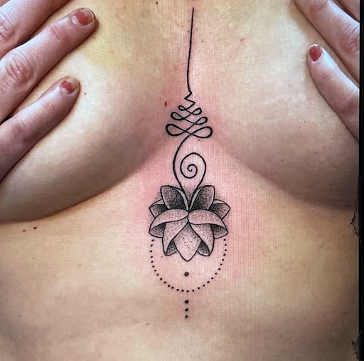 Explore thigh cover up tattoo ideas, creative tattoo ideas in Rehoboth Beach, available at Tattoo Galaxy (Rehoboth Beach) Piercing & Custom tattoos