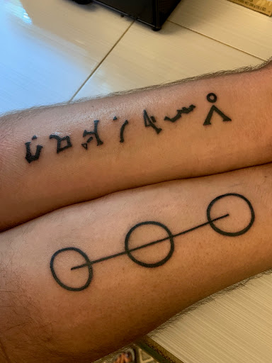 Explore wolf neck tattoo ideas, creative tattoo ideas in Vinton, available at Cherry Bomb Tattoo and piercing