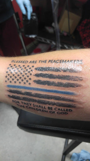 Explore neck name tattoo ideas, creative tattoo ideas in Bradley, available at Oak and Ember Tattoo