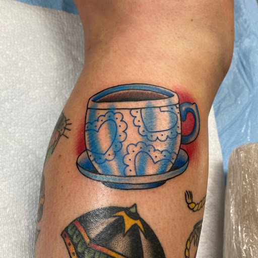 Explore bass fish tattoo ideas, creative tattoo ideas in Delaware, available at Rose & Web Tattoo