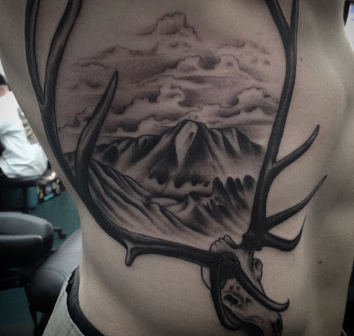 Explore men sleeve tattoo ideas, creative tattoo ideas in Glenwood Springs, available at Spyder Rose Tattoo