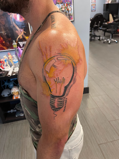 Explore minimalist lotr tattoo ideas, creative tattoo ideas in Palm Harbor, available at Angry Owl Tattoo and Piercing