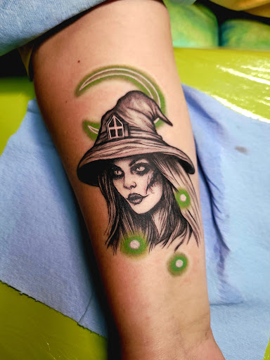 Explore charlie brown tattoo ideas, creative tattoo ideas in Benton, available at Spectrum Tattoo