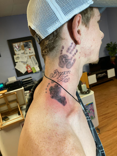 Explore back shoulder tattoo ideas for men, creative tattoo ideas in Cottonwood, available at AwakenInk Body Arts