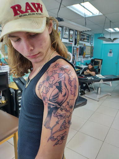 Explore 5sos tattoo ideas, creative tattoo ideas in Saint Petersburg, available at Edens Apple Tattoos and Piercings