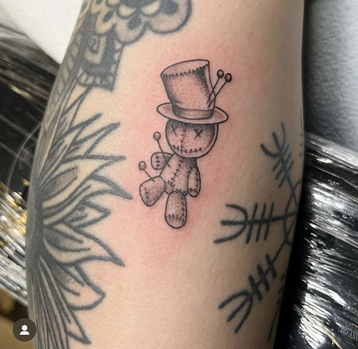 Explore cherry blossom tattoo ideas, creative tattoo ideas in New Orleans, available at Downtown Tattoos and Piercing