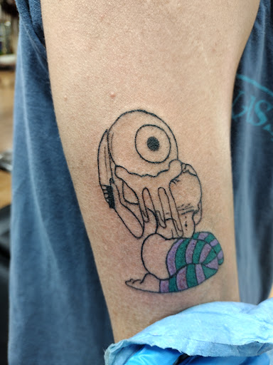 Explore strength tattoo ideas, creative tattoo ideas in Benton, available at Spectrum Tattoo