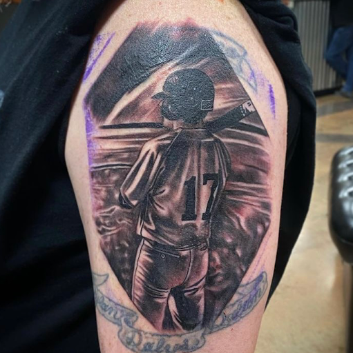 Explore father tattoo ideas for son, creative tattoo ideas in Oklahoma City, available at Oklahoma Tattoo Collective