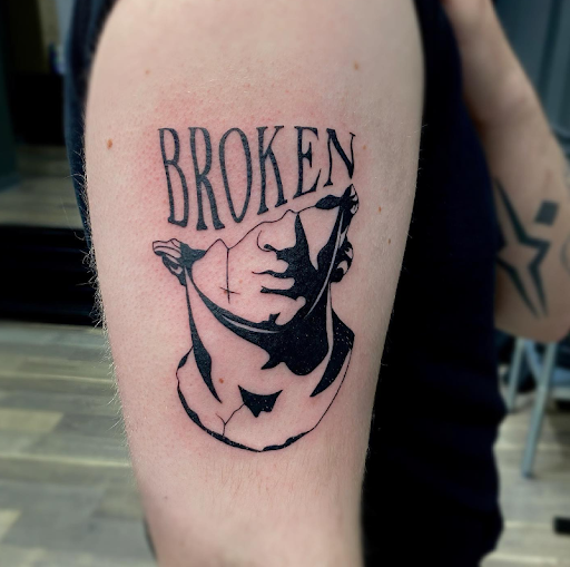 Explore women's leg tattoo ideas, creative tattoo ideas in Keene, available at Creative Ink Tattoo Studio