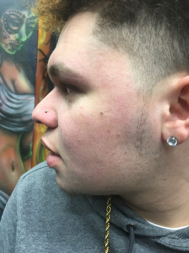 Tattoo Shop «Shrunkin Head Tattoo», reviews and photos, 4438 St John Ave, Kansas City, MO 64123, USA