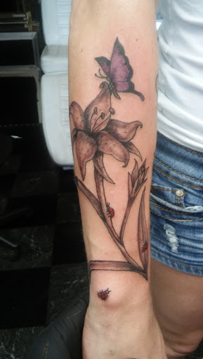 Explore songbird tattoo ideas, creative tattoo ideas in Big Spring, available at A Mom & Pop Tattoo Shop