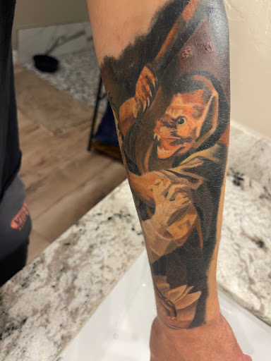 Explore black flower tattoo ideas, creative tattoo ideas in Glendale, available at PRINCE ART AND INK