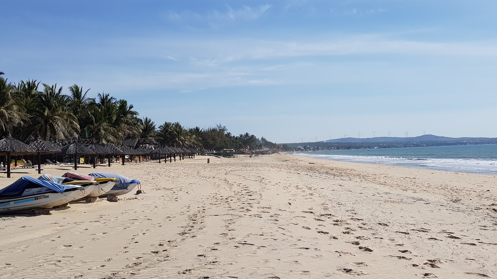 Foto von Ham Tien Beach mit beiger sand Oberfläche