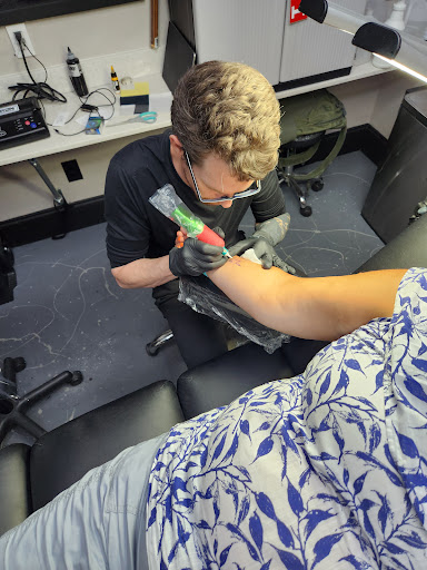 Explore water lily tattoo ideas, creative tattoo ideas in Myrtle Beach, available at Elite Ink Tattoos of Myrtle Beach