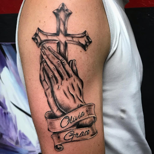 Explore elbow tattoo ideas for men, creative tattoo ideas in Lake Dallas, available at Fallen Ink Tattoo Studio LLC