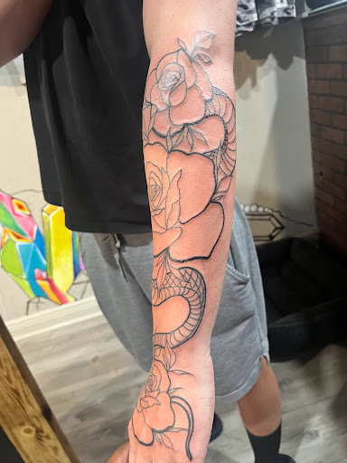 Explore ironman triathlon tattoo ideas, creative tattoo ideas in Cape Coral, available at UNRIVALED INK