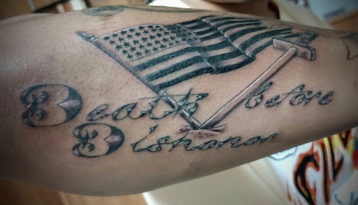 Explore footprints in the sand tattoo ideas, creative tattoo ideas in Clintonville, available at Temple Ink Tattoo Shop