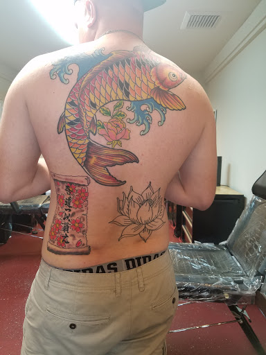 Explore half sleeve tattoo ideas black and grey, creative tattoo ideas in Kailua Kona, available at Lady Luck Tattoo & Body Piercing