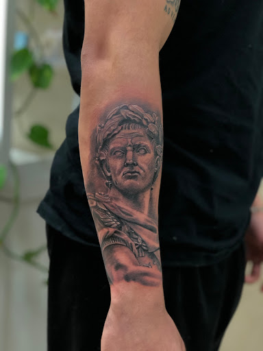 Find chrysanthemum tattoo ideas for your next unique tattoo in Astoria at Xolotl Tattoo Gallery