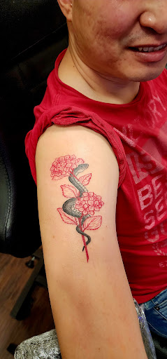 Explore olive branch tattoo ideas, creative tattoo ideas in Cary, available at EL ZORRO TATTOO and piercing