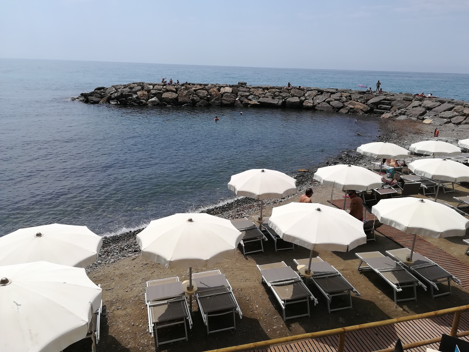 Photo de Foce beach avec l'eau bleu de surface