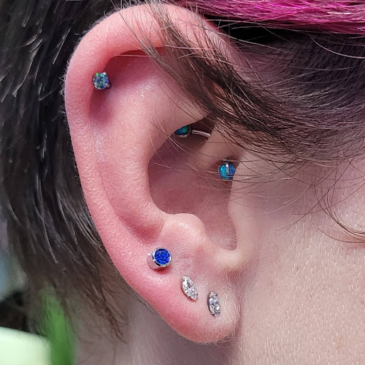 Explore forearm rose tattoo ideas, creative tattoo ideas in Marysville, available at Hawaiian Touch Piercing Co.