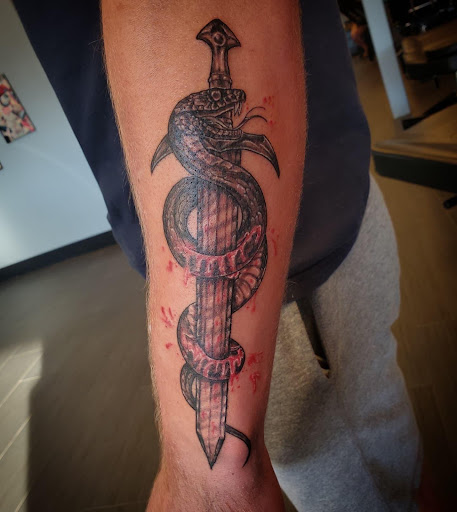 Explore kidney tattoo ideas, creative tattoo ideas in Palm Harbor, available at Angry Owl Tattoo and Piercing