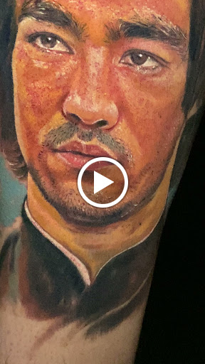 Explore peck tattoo ideas, creative tattoo ideas in Mcallen, available at World Famous La Mancha Tattooz