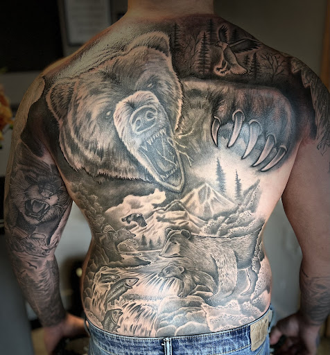 Explore live love laugh tattoo ideas, creative tattoo ideas in Osage Beach, available at Lake Ozark Tattoo and Hair Studio